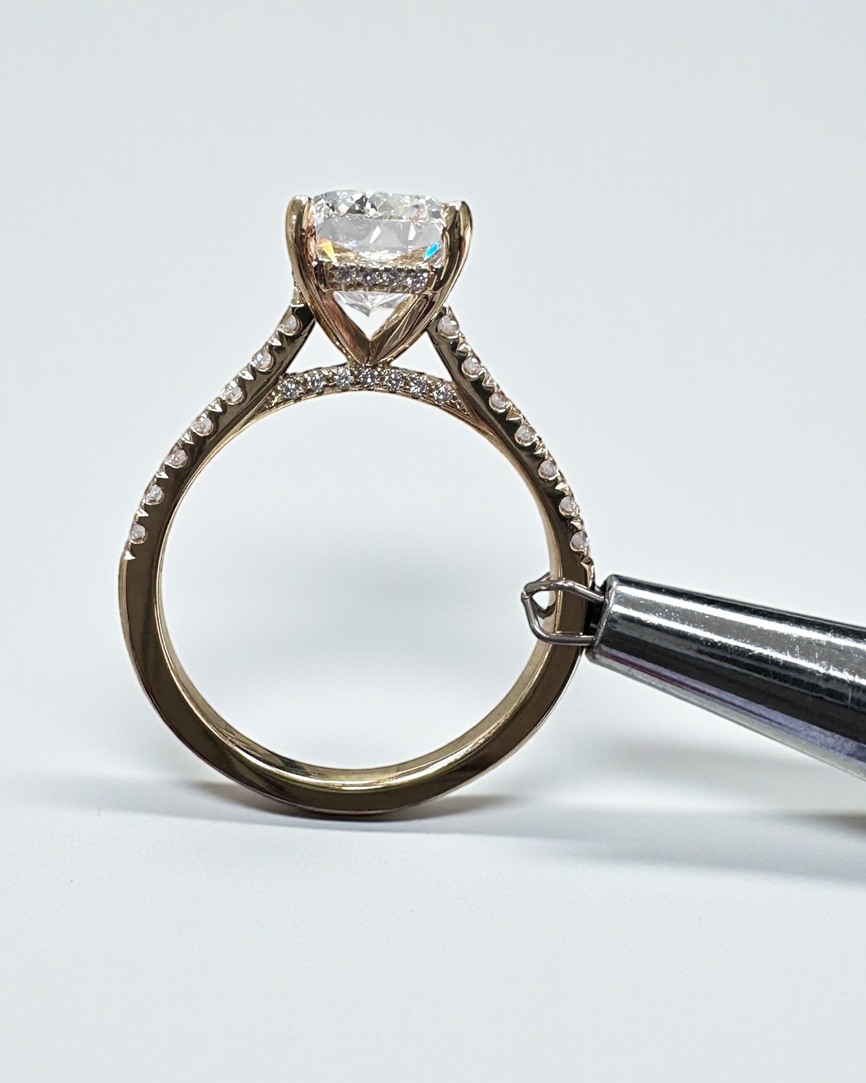 3ct elongated cushion cut lab grown diamond cathedral engagement ring hidden halo