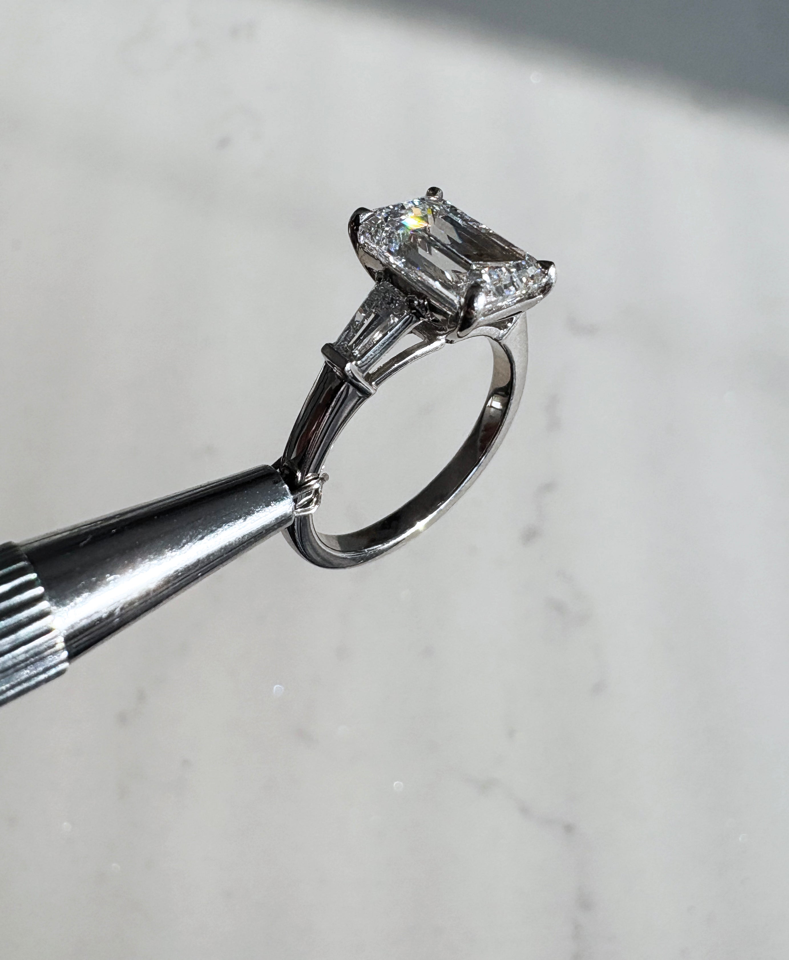 3ct Emerald Cut & Tapered Baguettes Trilogy diamond engagement rings.