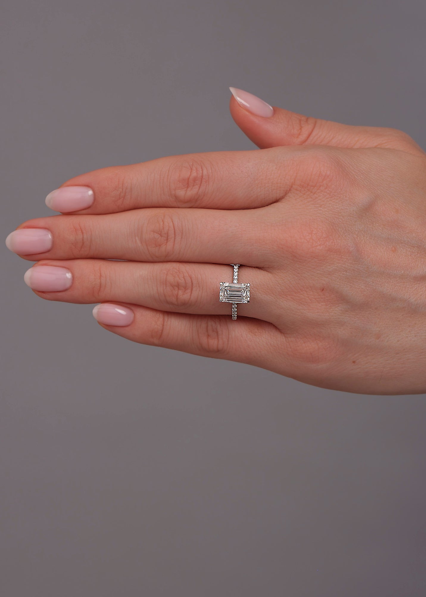 3ct Emerald Hidden Halo Shoulders lab grown diamond engagement rings.