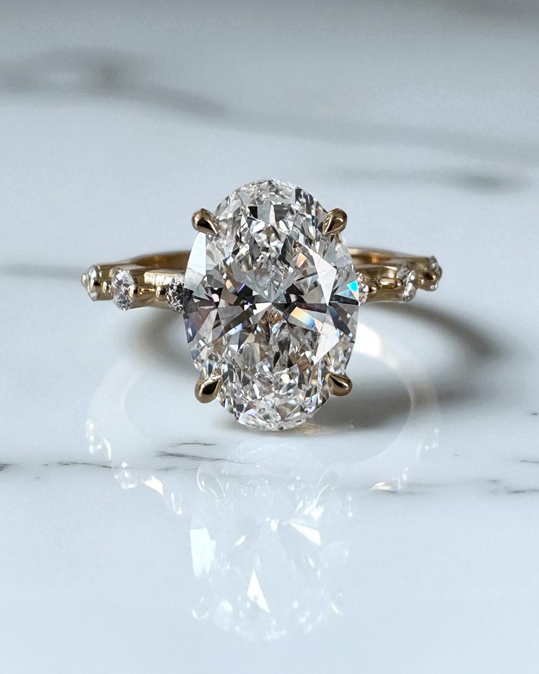 3ct Oval Spaced Band Lab Grown Diamond Engagement Rings in London.