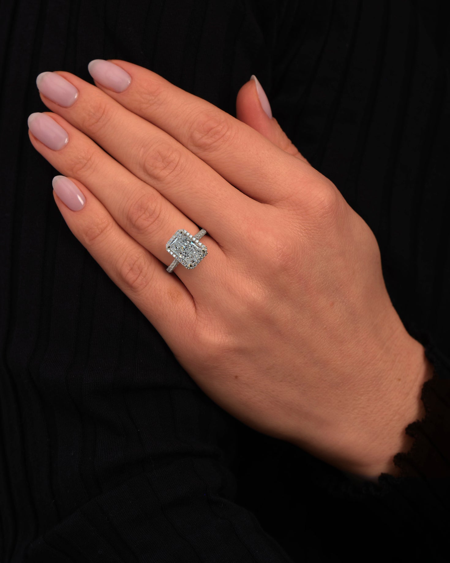 3ct radiant cut seamless halo 3d diamond band engagement ring yellow gold lab grown diamond on hand