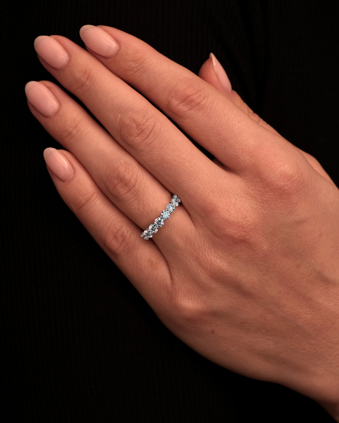 A stunning 1.50ct round half eternity ring from our diamond engagement band collection.
