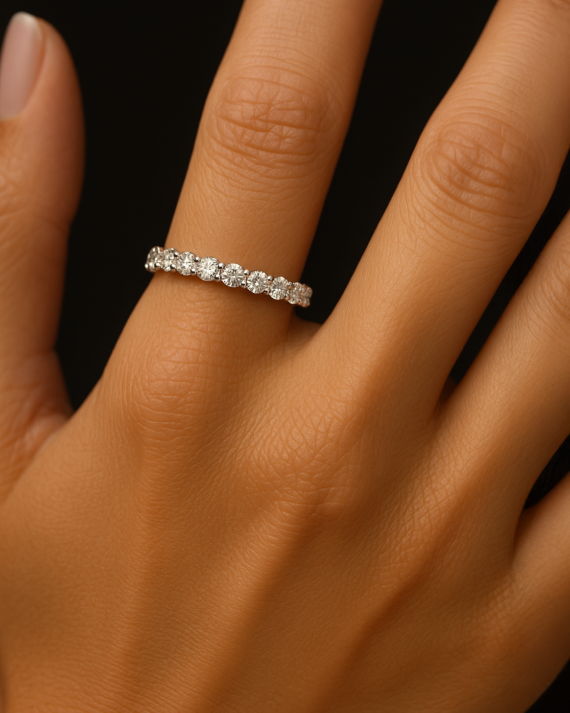 A beautiful 1ct round half eternity ring from our diamond wedding bands collection.