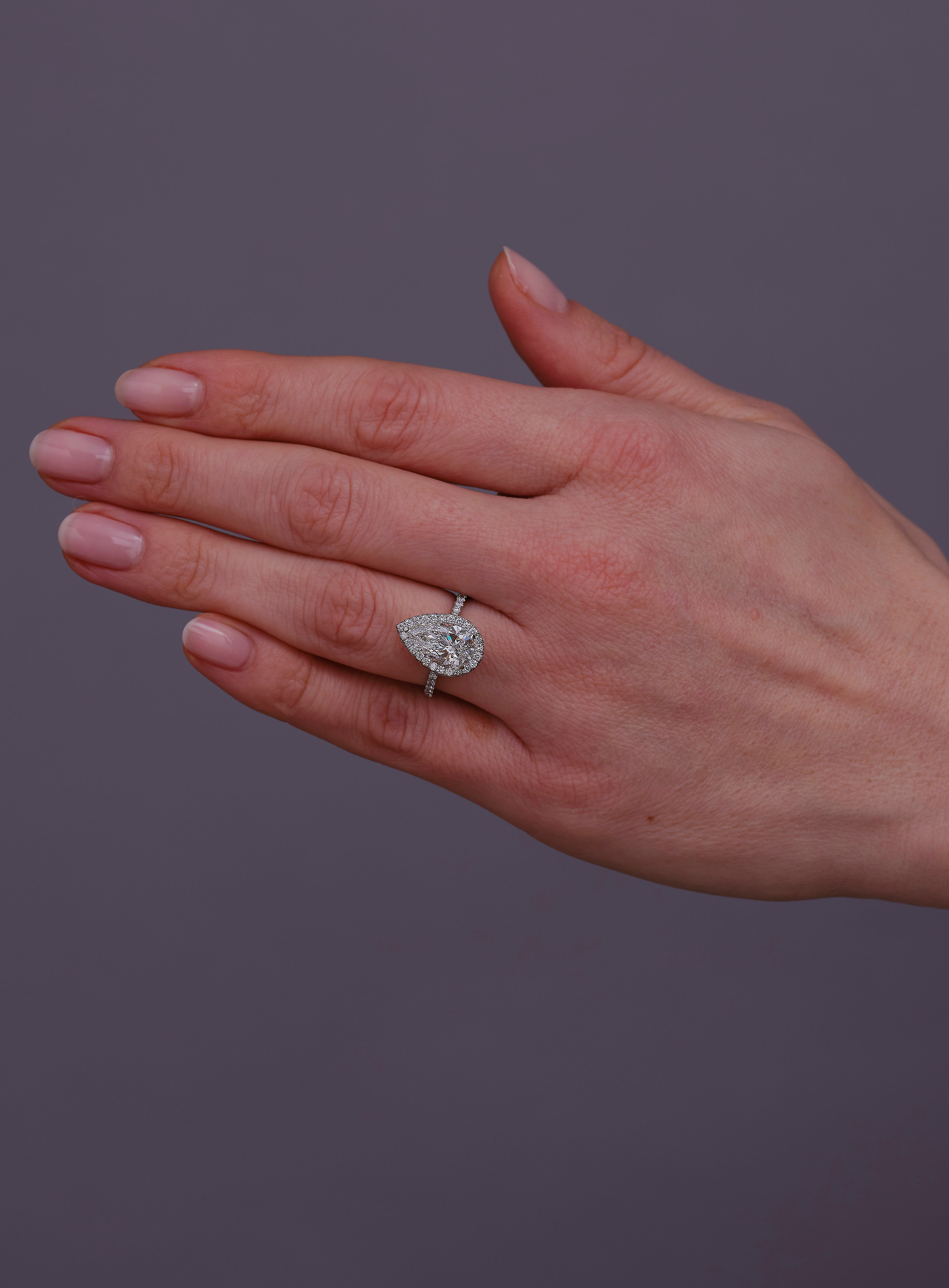 2.70ct Pear 2D Seamless Halo Lab Grown Diamond Engagement Rings.