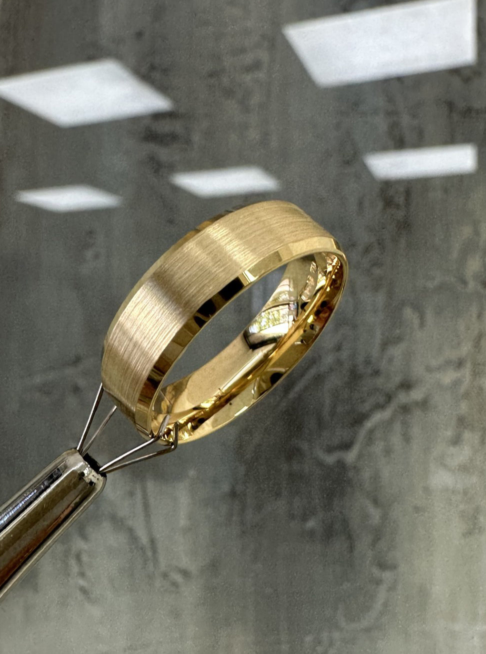 Side profile of the 6mm bevelled edge band, showcasing the clean angled borders in our wedding band for him range.
