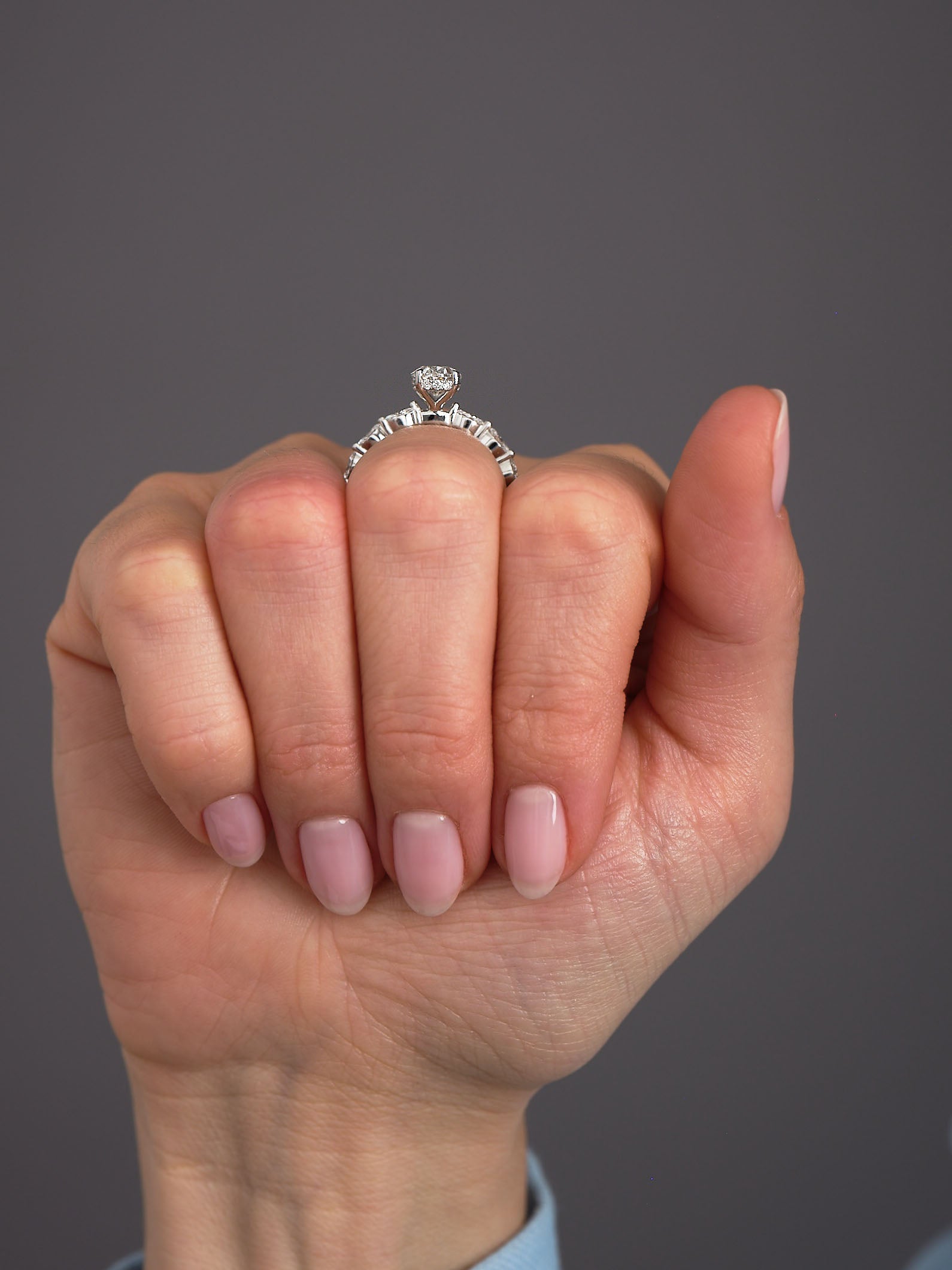 1.70ct Oval on a Marquise Band Lab Grown Diamond Engagement Rings.