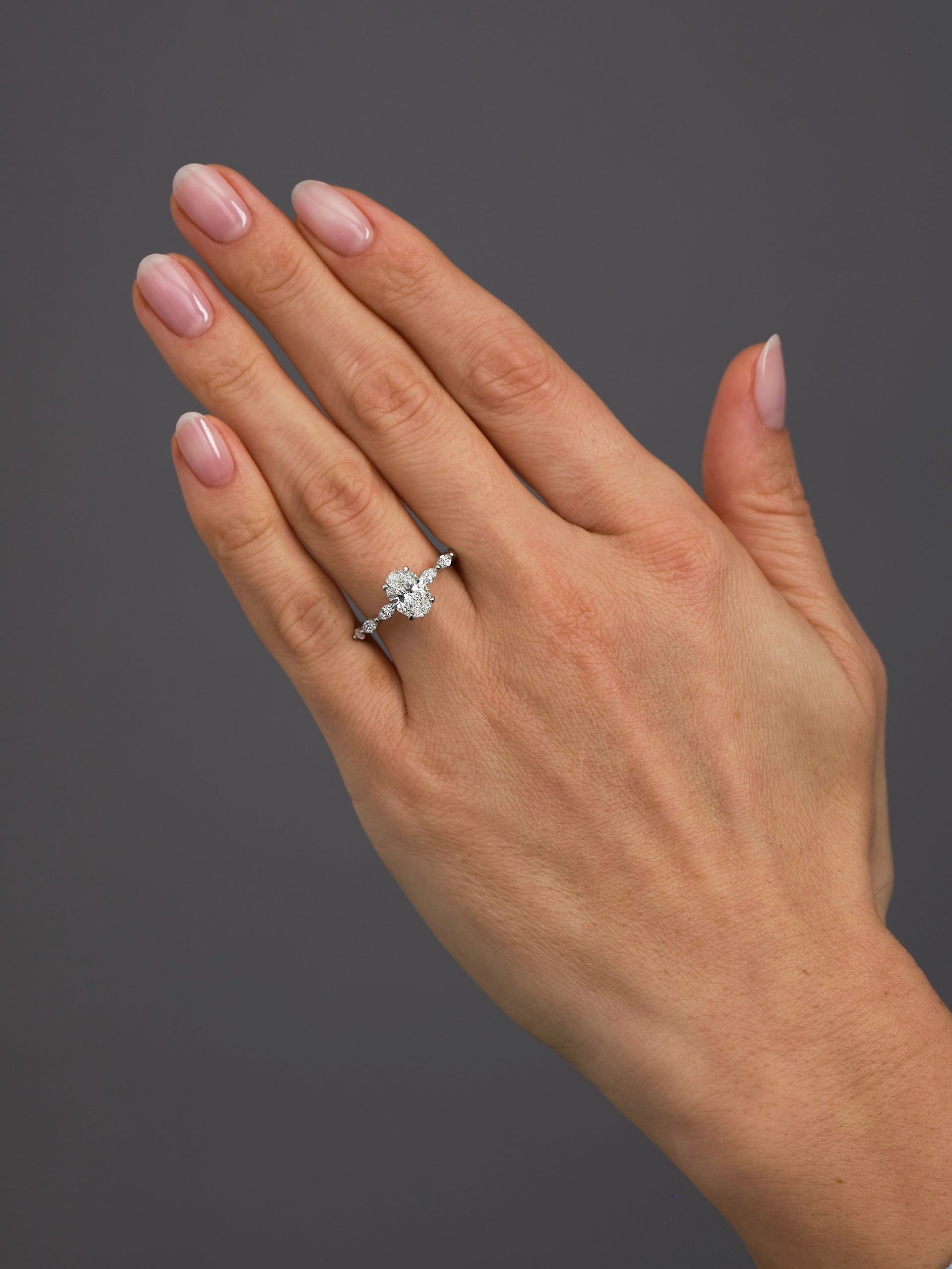 1.70ct Oval on a Marquise Band Lab Grown Diamond Engagement Rings.