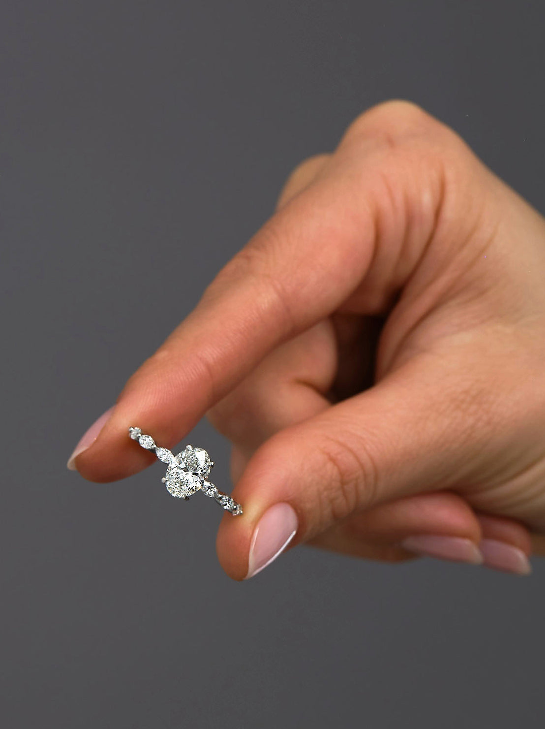 1.70ct Oval on a Marquise Band Lab Grown Diamond Engagement Rings.