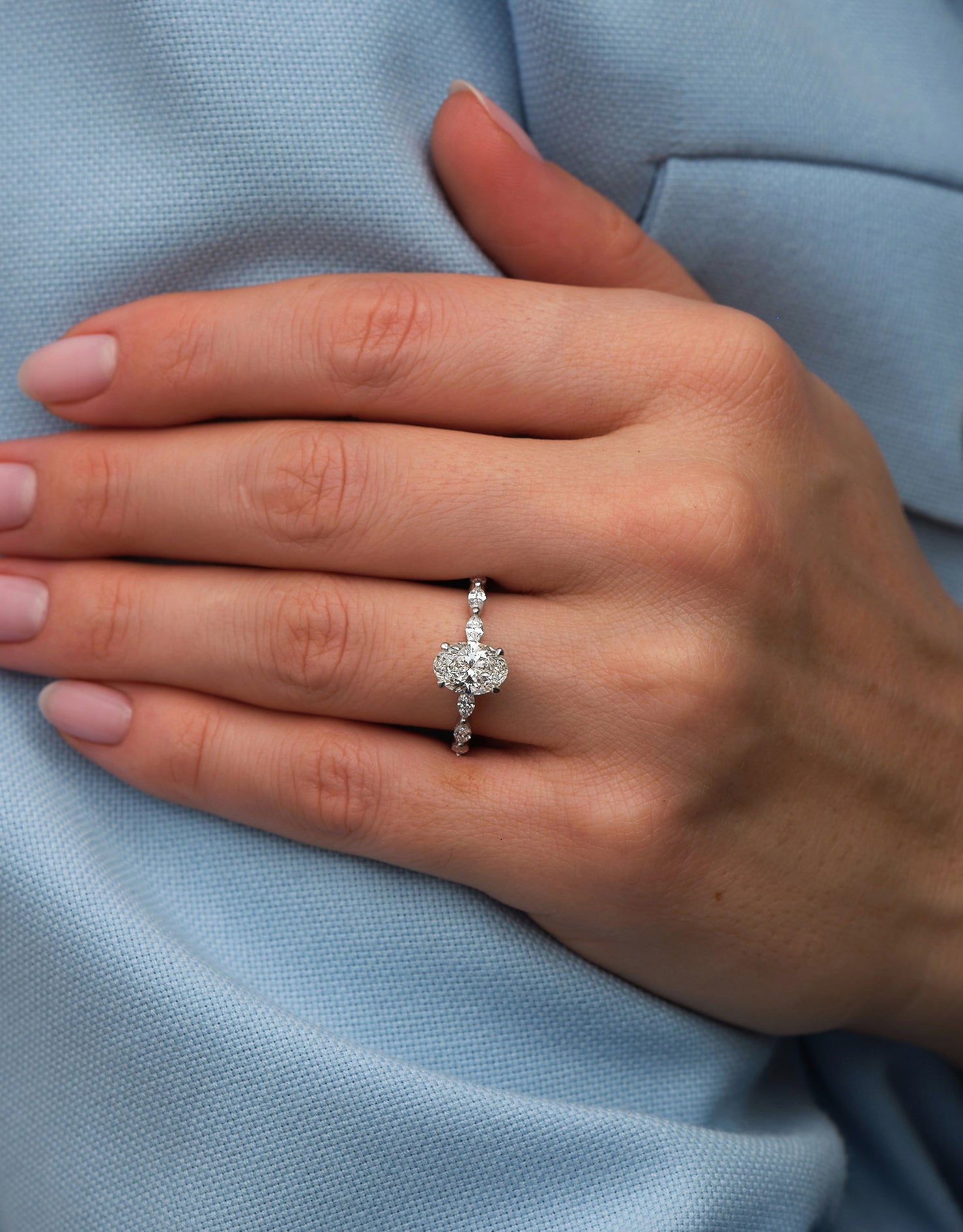 1.70ct Oval on a Marquise Band Lab Grown Diamond Engagement Rings.