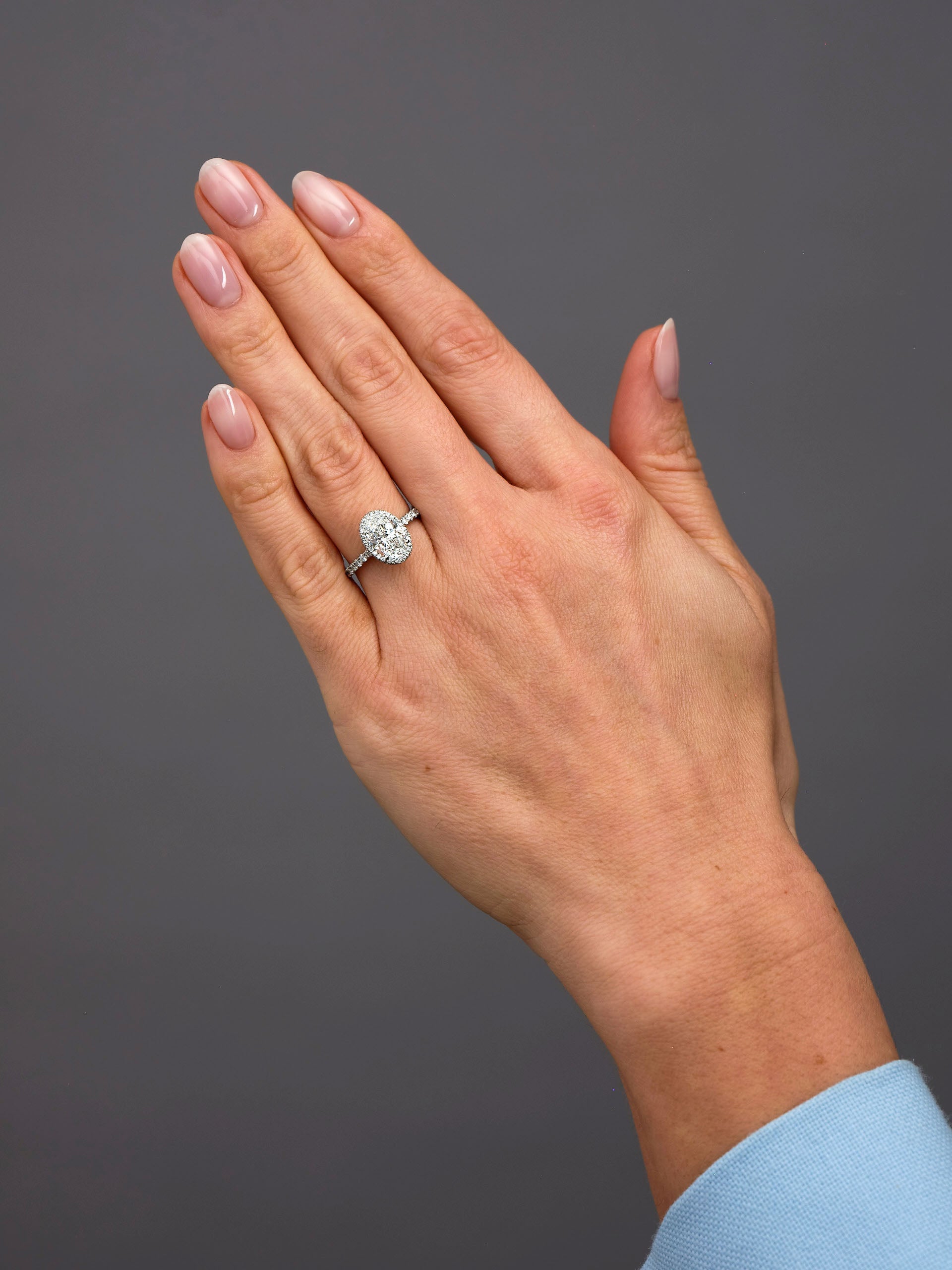 2ct Oval Seamless 2D Halo Lab Grown Diamond Engagement Rings in London.