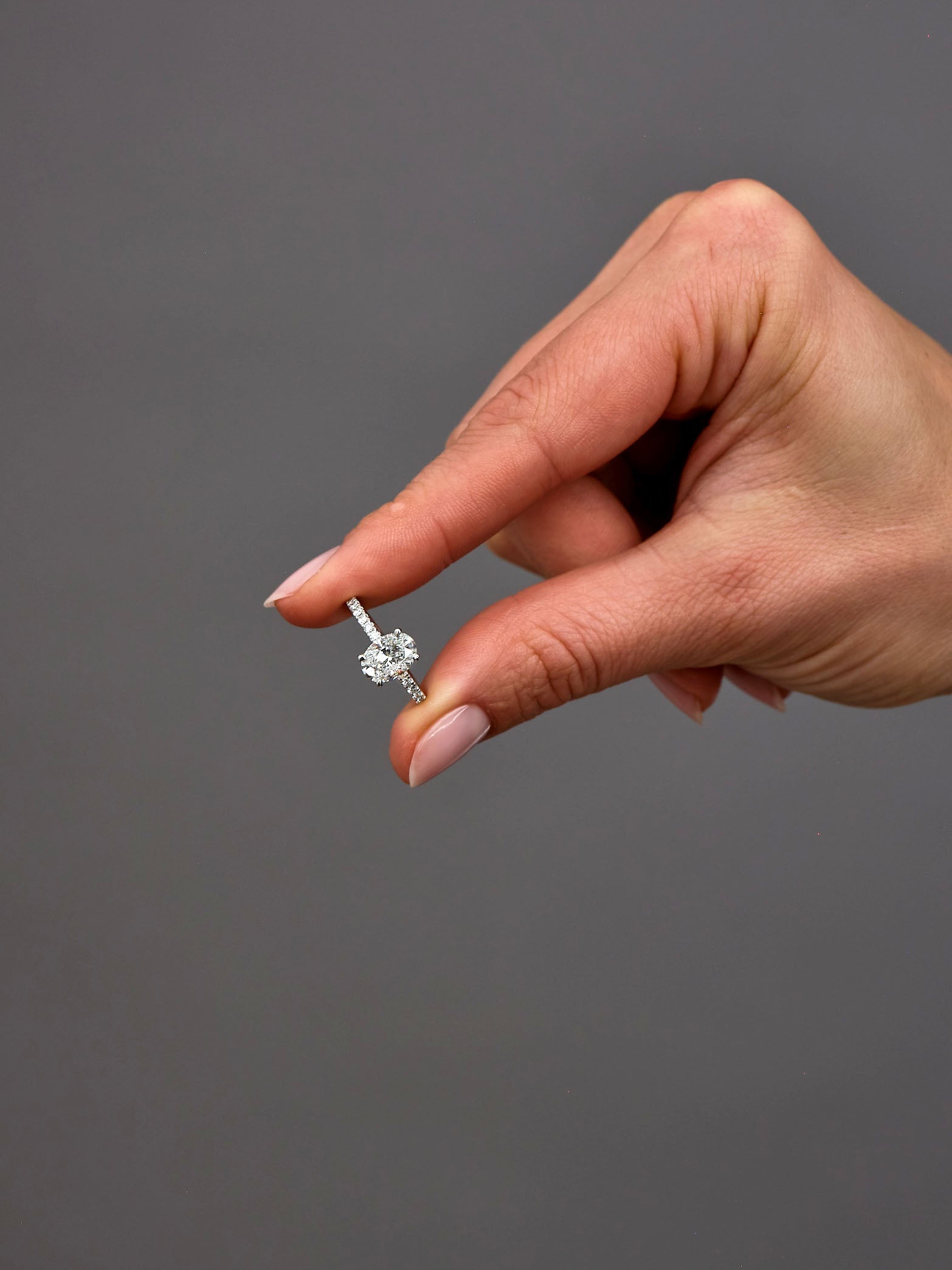 oval cut hidden halo lab grown diamond engagement rings