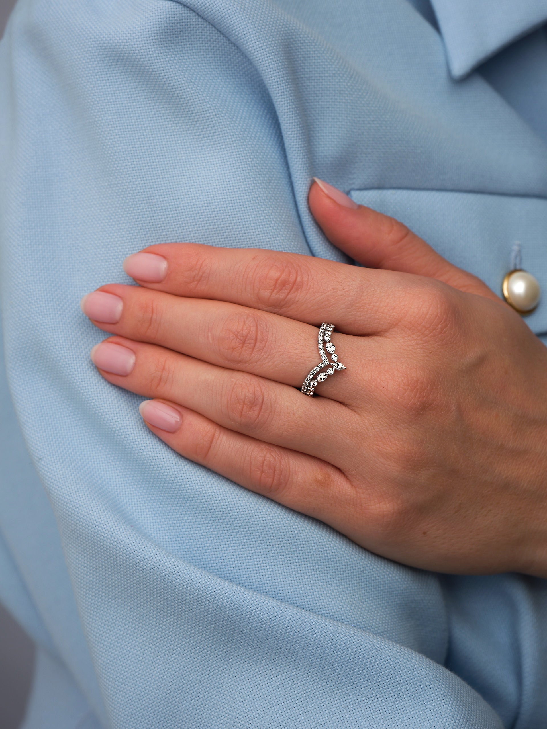 Side profile of the marquise wishbone band, showcasing the unique curved style in our engagement bands for her range.
