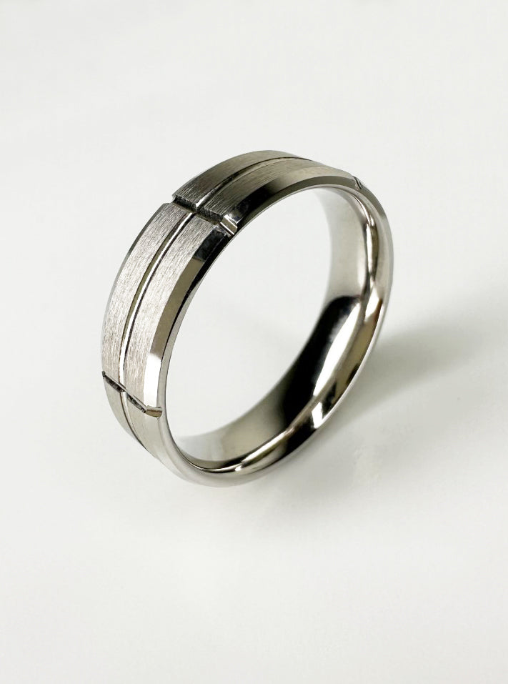 A contemporary 6mm bevelled edge grooved matt ring from our premium platinum engagement band collection.