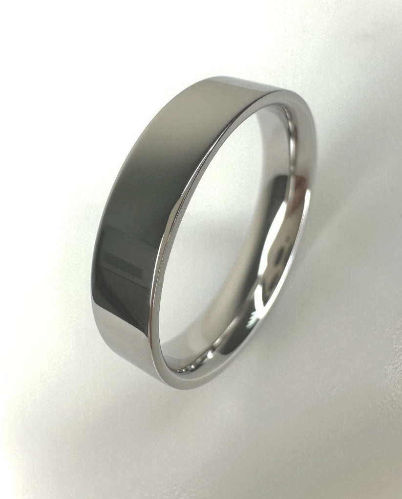 A modern flat court polished ring from our premium wedding band for him collection.