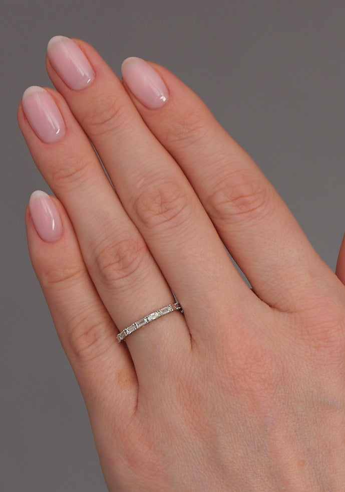 Close-up detail of the 0.40ct baguette diamonds on this elegant wedding bands for women style.