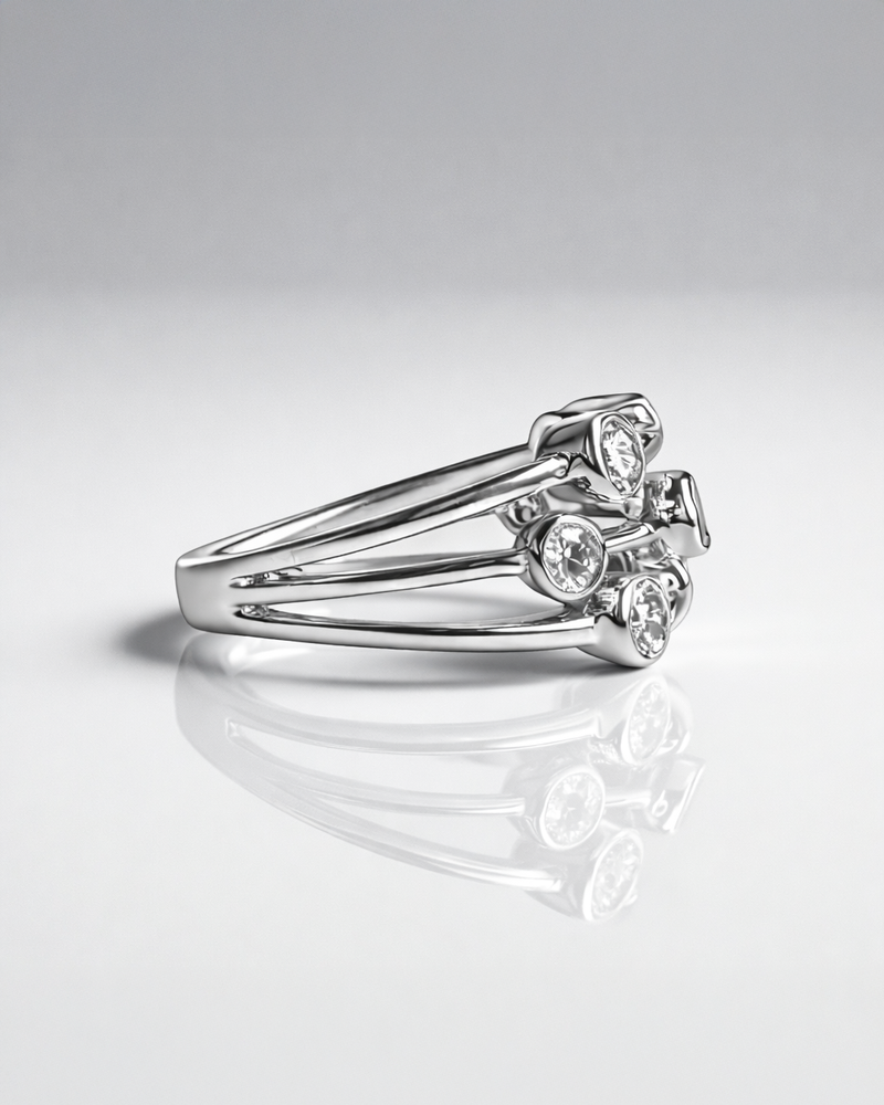 Close-up detail of the brilliant round diamonds on this midi bubble style diamond wedding bands.