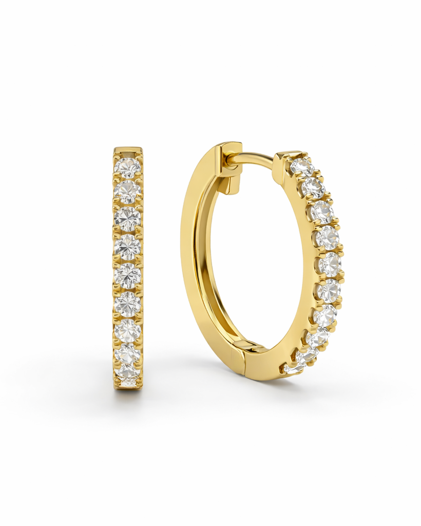 Diamond huggie earrings in 9kt or 18kt yellow, rose or white gold. Available in 0.10ct or 0.20ct sizes. Handcrafted and perfect for everyday wear.