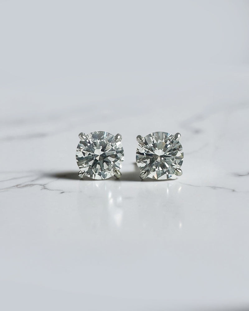 0.50ct round brilliant lab grown diamond martini stud earrings in a four prong setting handcrafted in white gold by Layla Diamonds