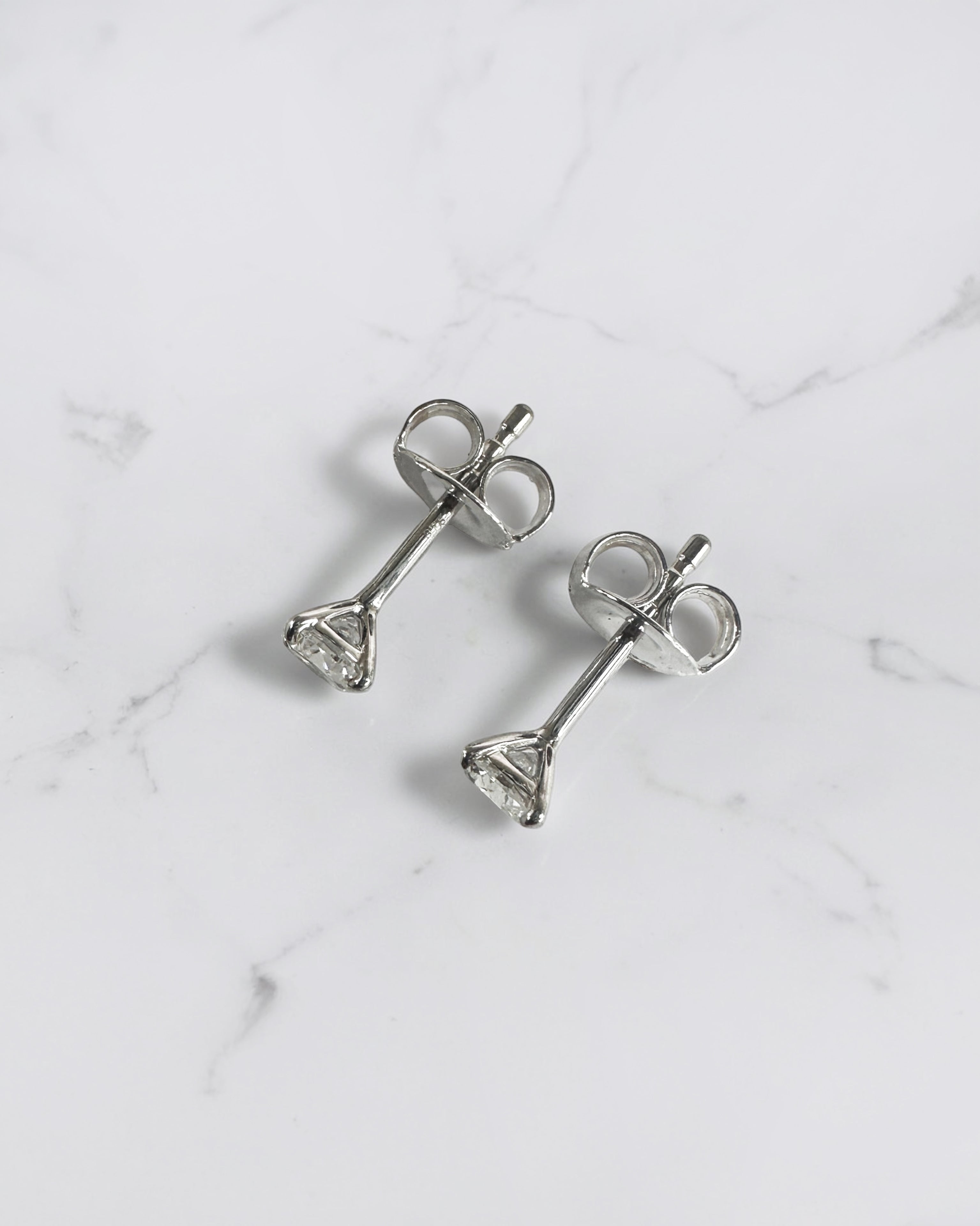 0.50ct round brilliant lab grown diamond martini stud earrings in a four prong setting handcrafted in white gold by Layla Diamonds