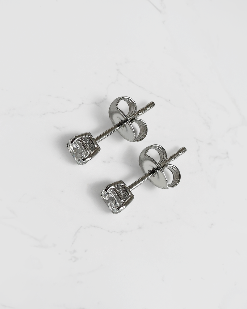 0.50ct round brilliant lab grown diamond stud earrings in a classic four claw setting with minimum E/F colour and VS1 clarity by Layla Diamonds.