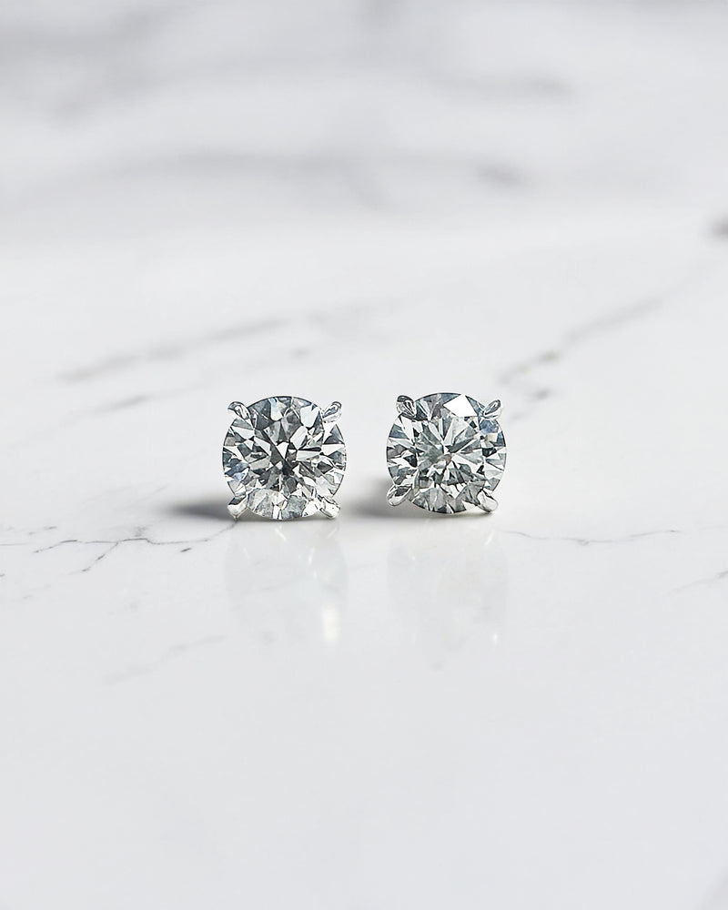 0.50ct round brilliant lab grown diamond martini stud earrings in a four prong setting handcrafted in white gold by Layla Diamonds