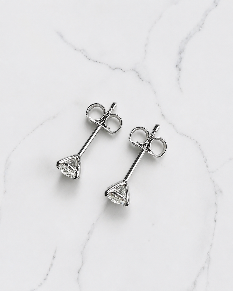 0.50ct round brilliant lab grown diamond martini stud earrings in a four prong setting handcrafted in white gold by Layla Diamonds