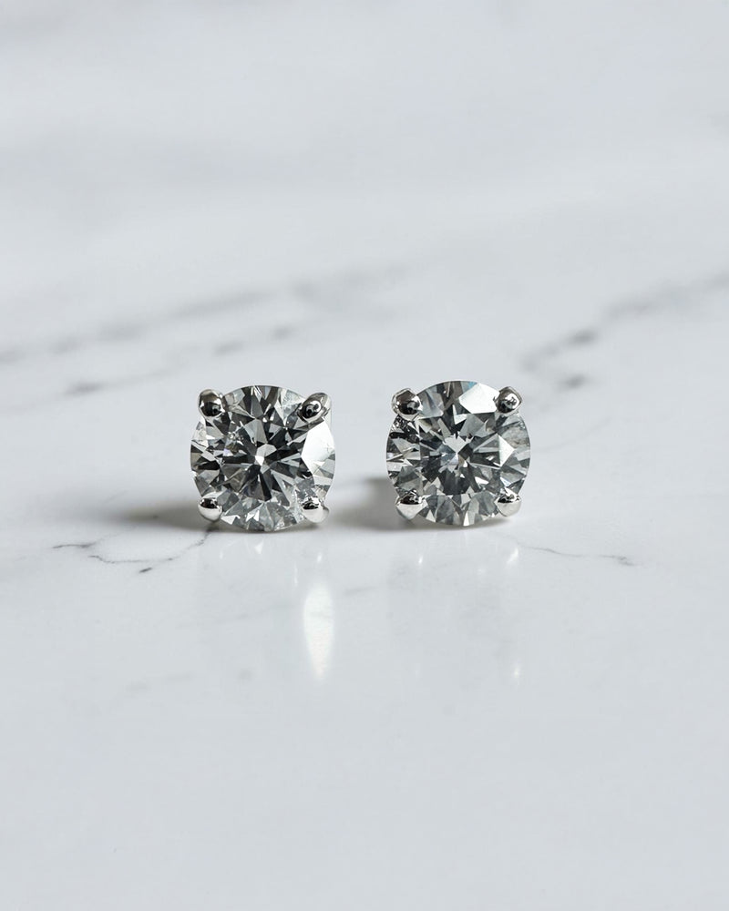 0.70ct round brilliant lab grown diamond stud earrings in a classic four prong setting handcrafted by Layla Diamonds