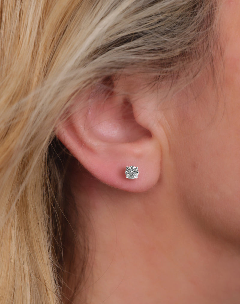 0.50ct round brilliant lab grown diamond martini stud earrings in a four prong setting handcrafted in white gold by Layla Diamonds