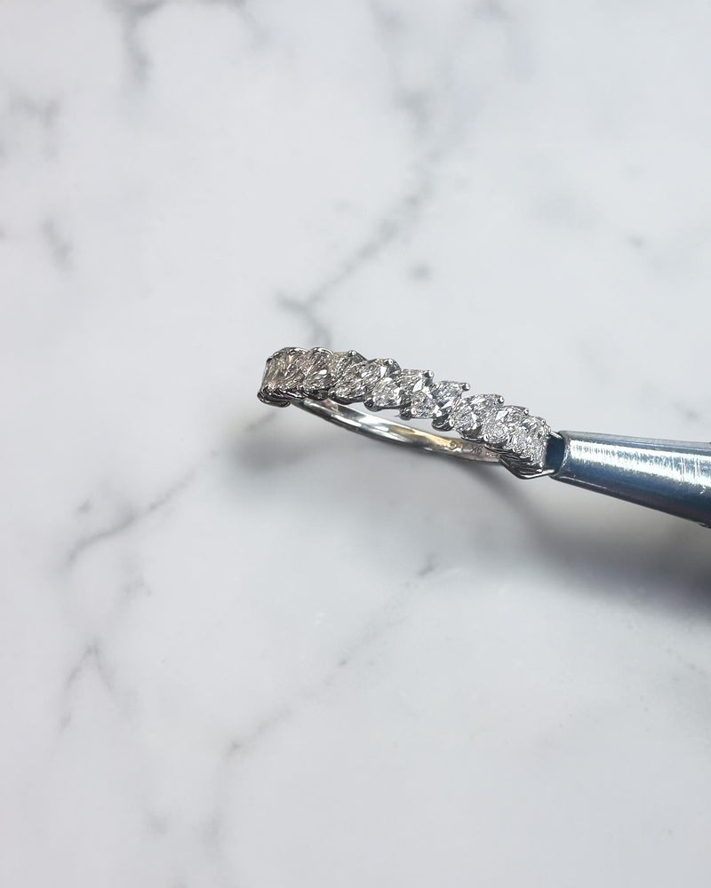 0.90ct slanted marquise cut diamond band with 0.90ct total diamonds in a claw setting, available in platinum or gold with lab grown or natural diamonds.
