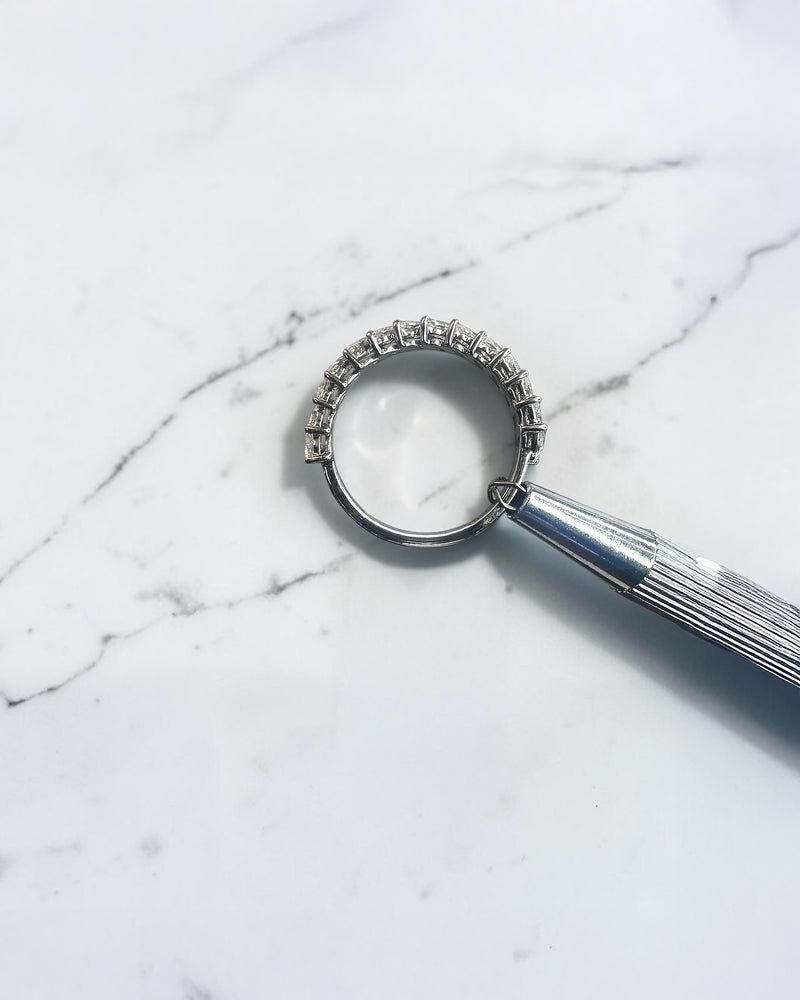 0.90ct slanted marquise cut diamond band with 0.90ct total diamonds in a claw setting, available in platinum or gold with lab grown or natural diamonds.