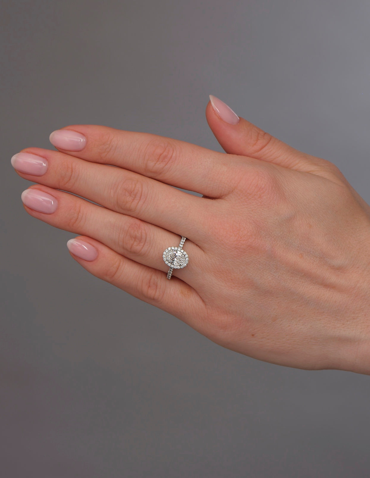 1.30ct Oval Seamless Halo Lab Grown Diamond Engagement Rings in London.