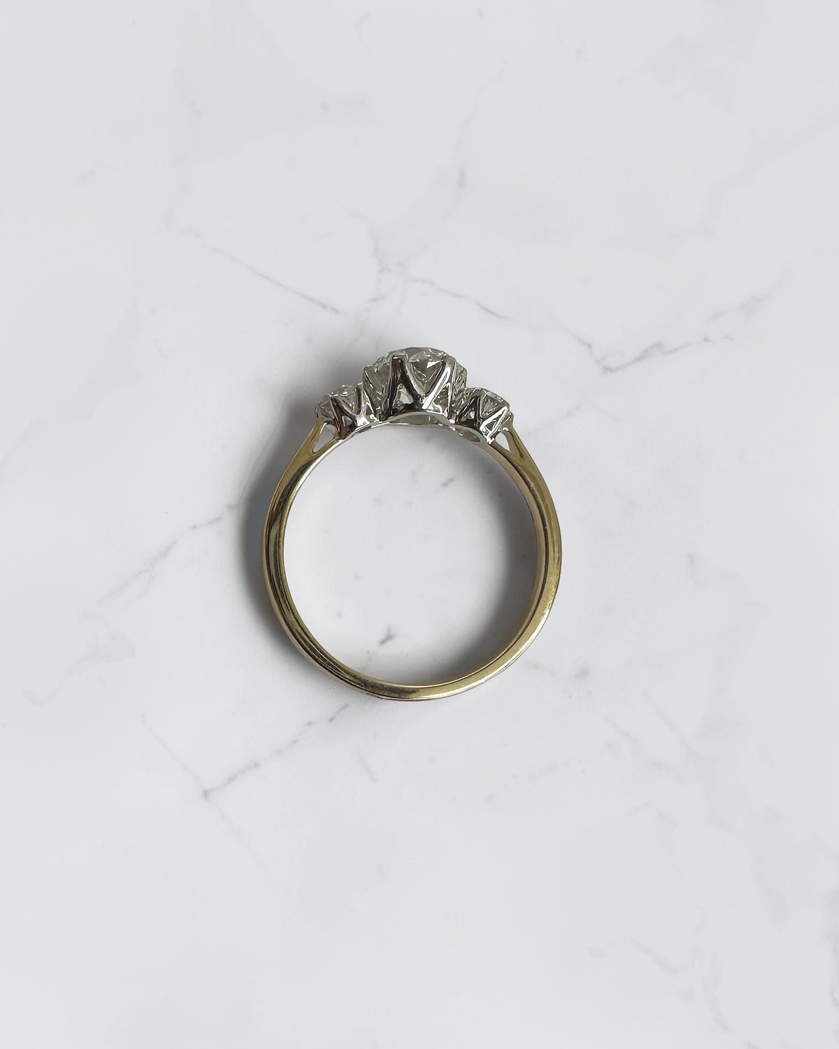 1.40ct Old Mine Cut trilogy diamond engagement ring with 1ct centre diamond, platinum setting and 18ct yellow gold band.