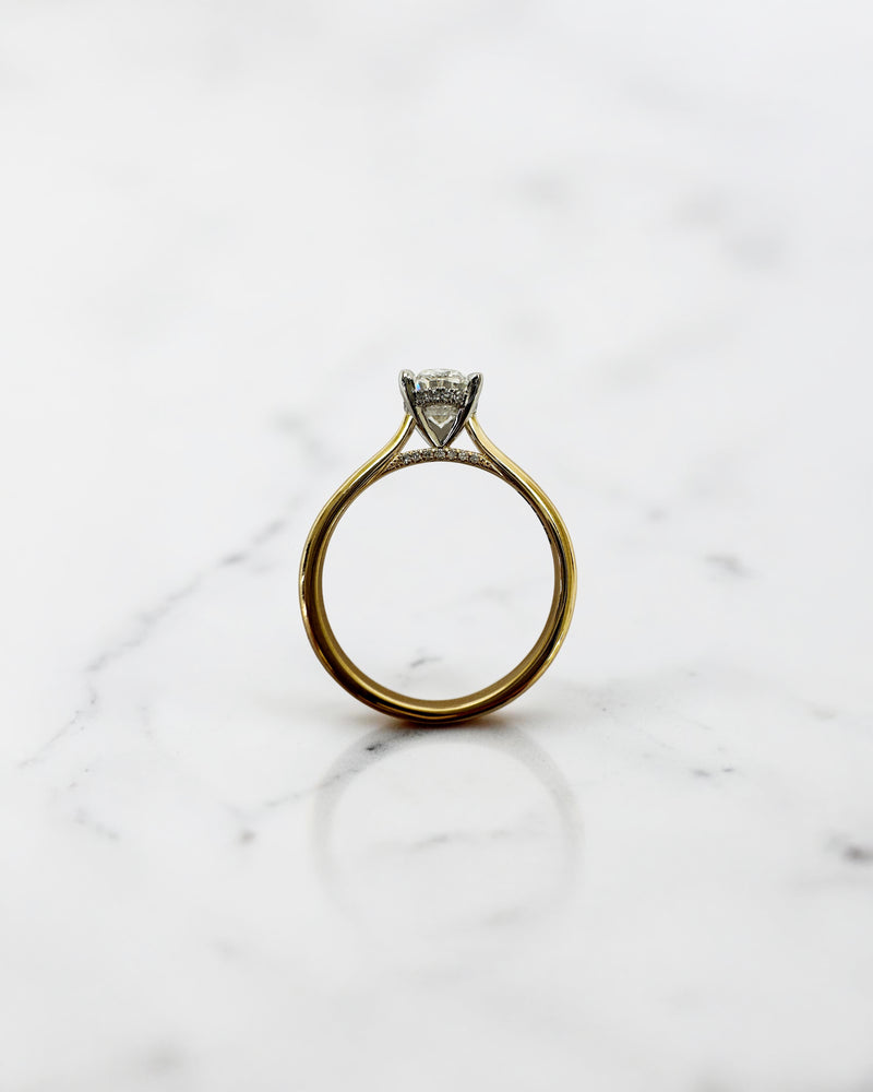 Oval cut diamond solitaire ring 1.50ct, classic cathedral design, two tone yellow gold band with platinum head
