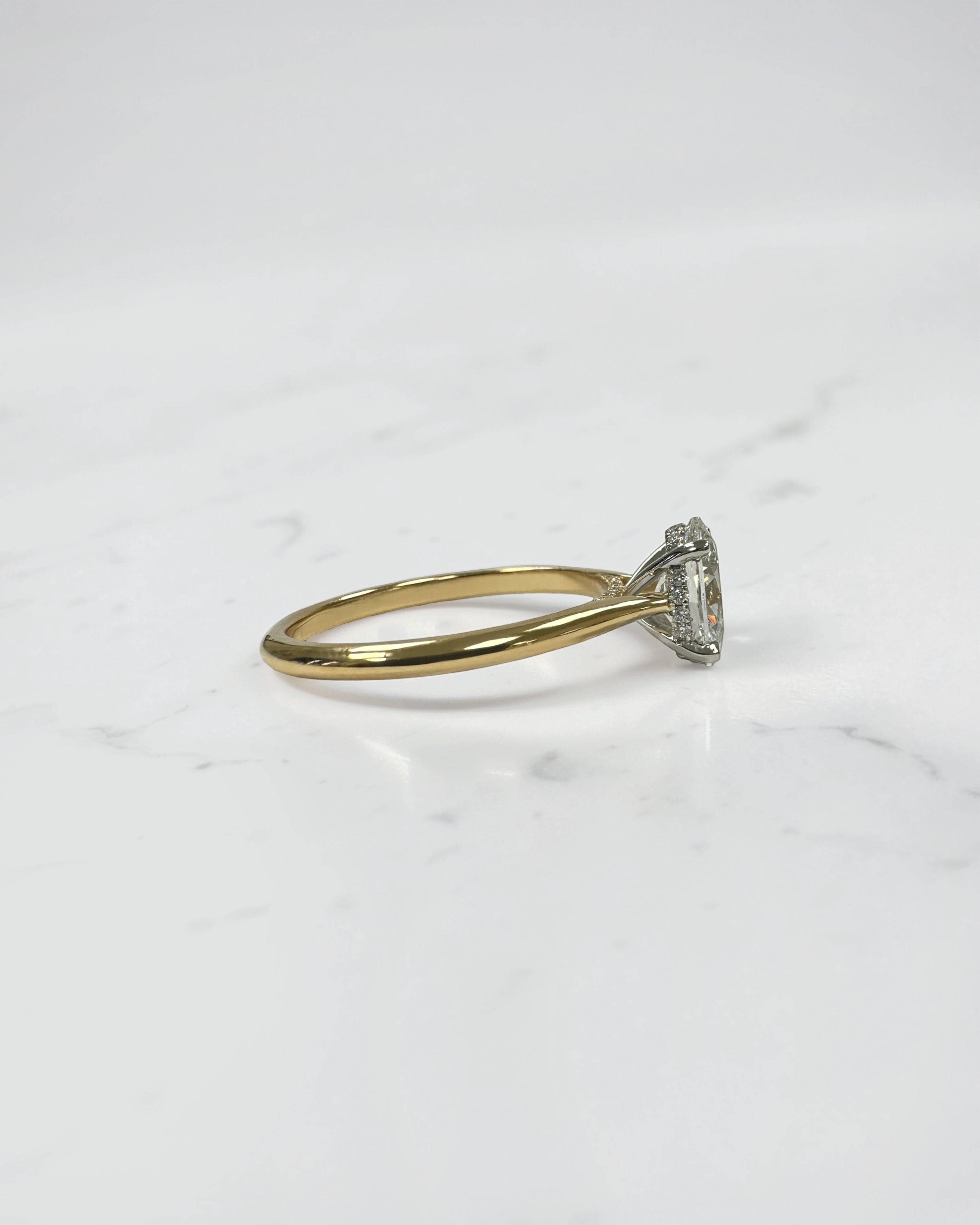 Oval cut diamond solitaire ring 1.50ct, classic cathedral design, two tone yellow gold band with platinum head