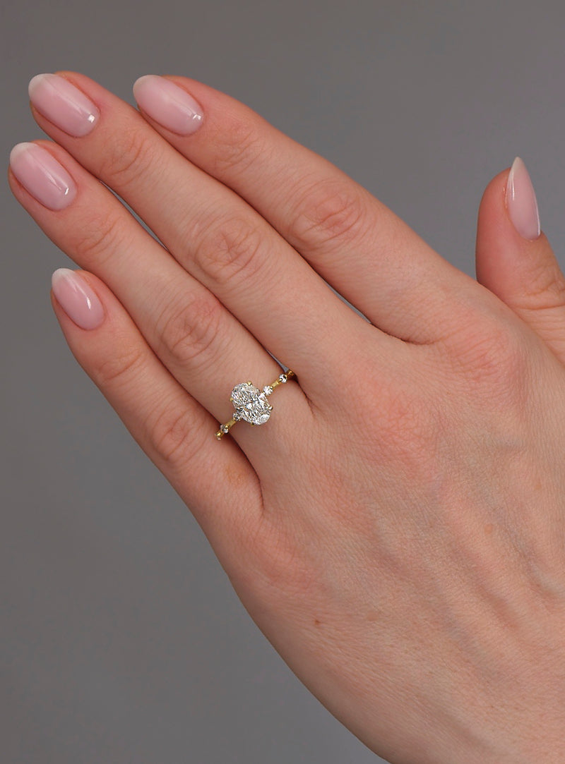 oval cut bubble set Lab Grown Diamond Engagement Rings