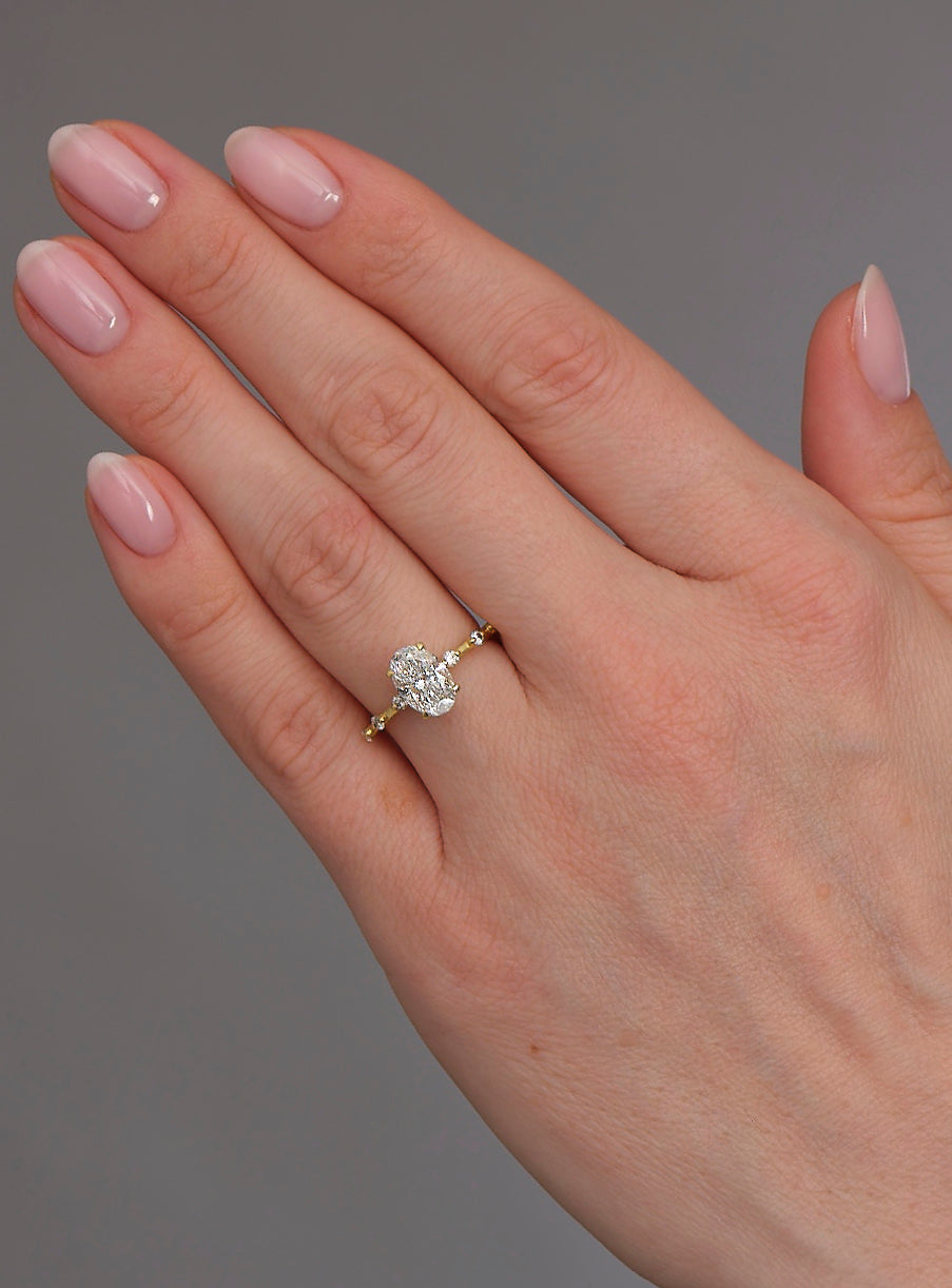 oval cut bubble set Lab Grown Diamond Engagement Rings