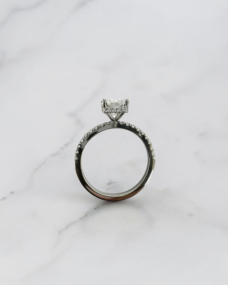 1.80ct radiant cut lab grown diamond engagement ring with diamond shoulder band and wrap around hidden halo in platinum, handmade in London by Layla Diamonds.