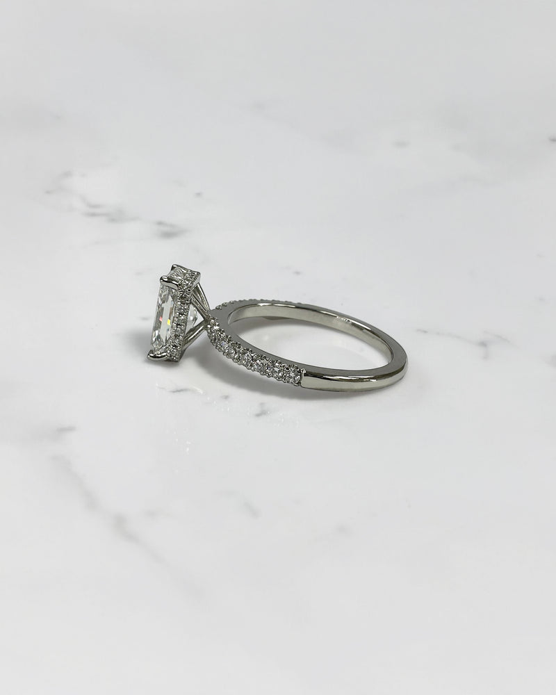 1.80ct radiant cut lab grown diamond engagement ring with diamond shoulder band and wrap around hidden halo in platinum, handmade in London by Layla Diamonds.