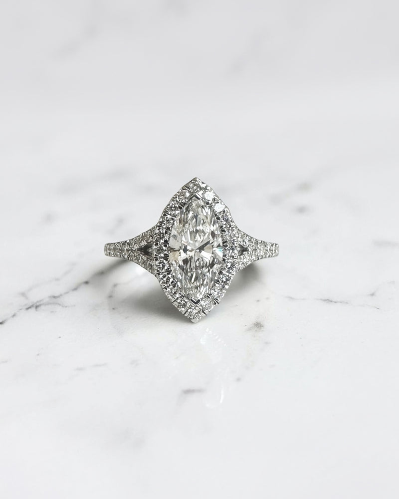 1ct marquise cut lab grown diamond halo engagement ring with diamond set split shoulders in white gold
