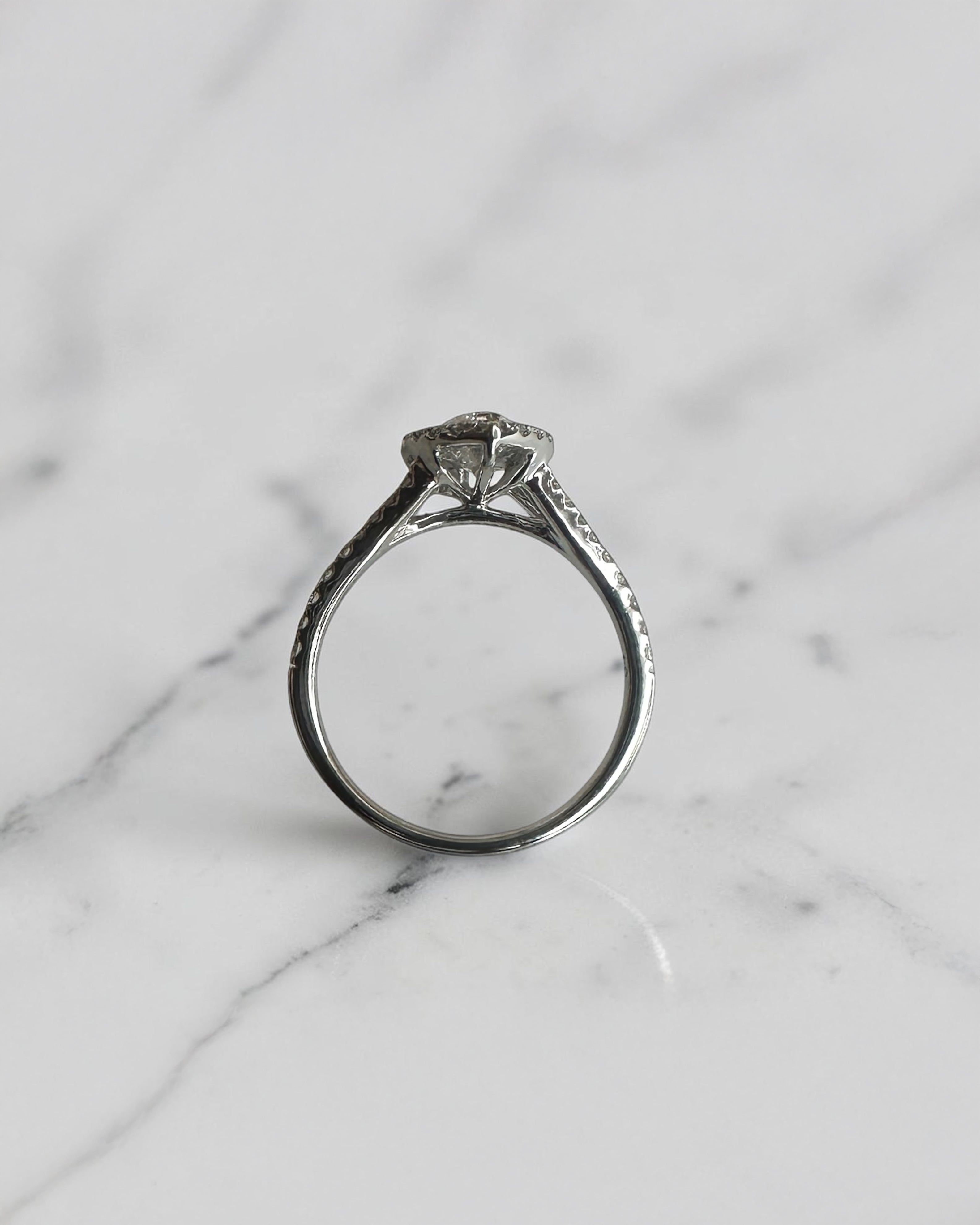 1ct marquise cut lab grown diamond halo engagement ring with diamond set split shoulders in white gold
