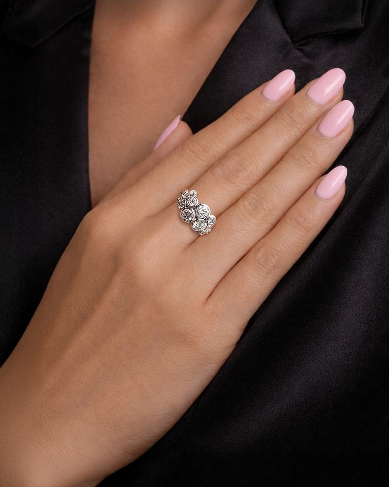 Bubble diamond ring with bezel set round diamonds, front view showing clustered bubble design. 9kt or 18kt yellow or white gold on hand