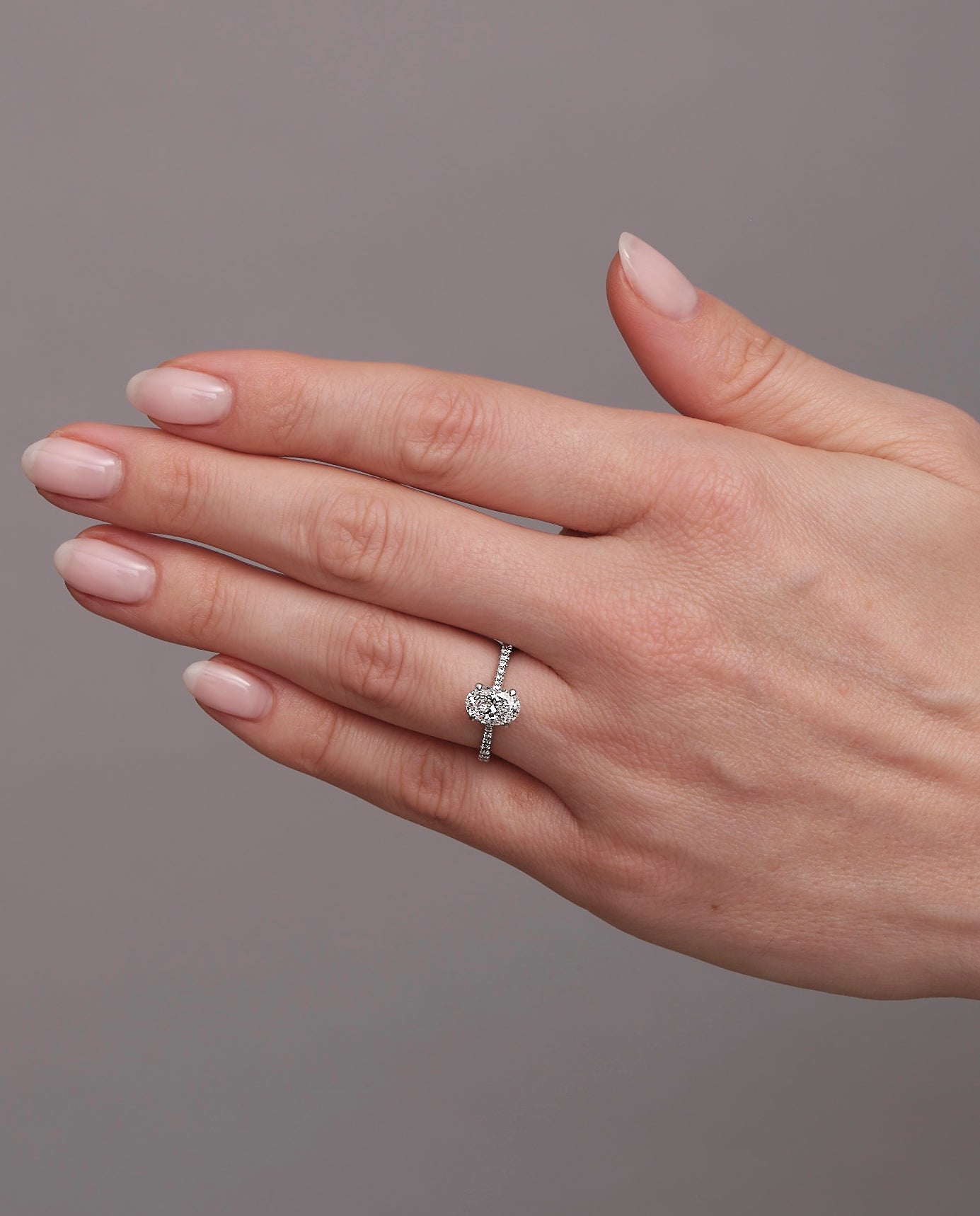 1.25ct Oval Cut Cathedral Setting Lab Grown Diamond Engagement Rings.
