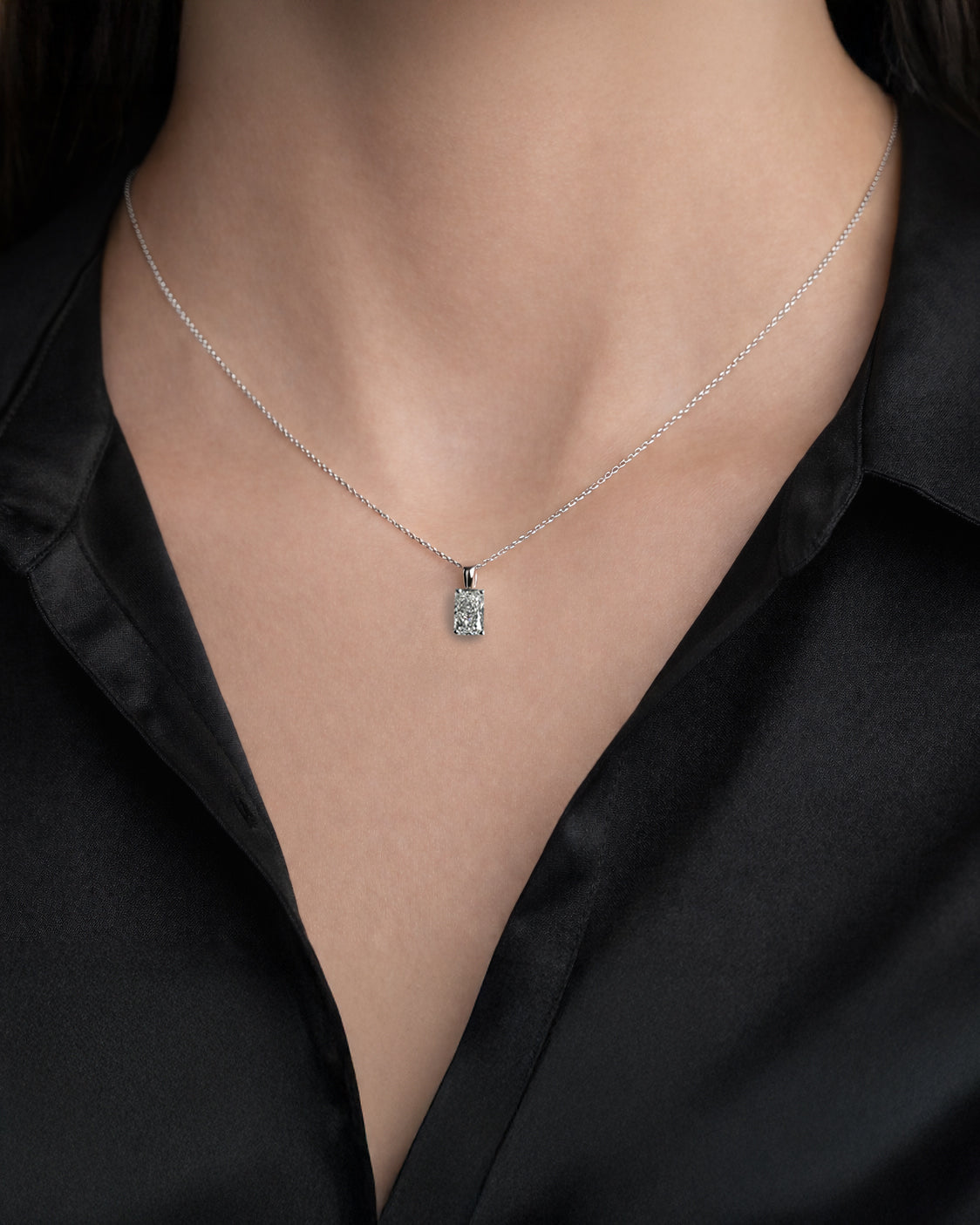 1ct radiant cut lab grown diamond pendant necklace on adjustable chain 9kt or 18kt white or yellow gold worn on neckline