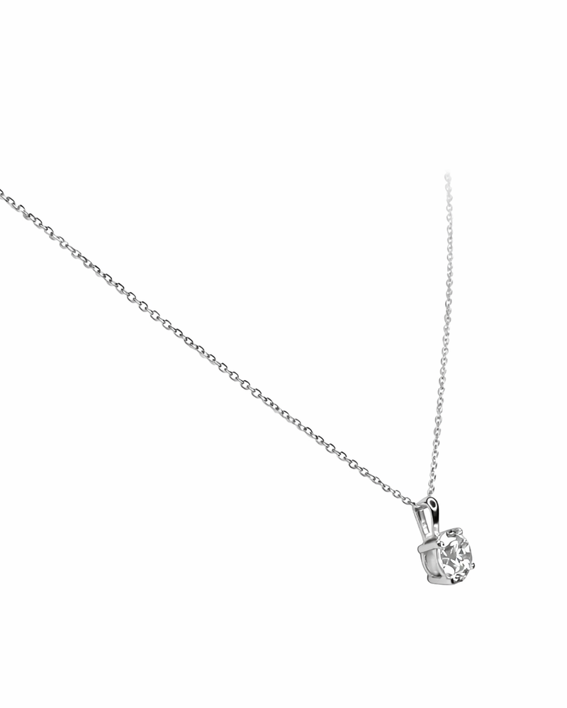 Timeless 1ct round brilliant cut diamond pendant with an adjustable 16–18 inch gold chain. Crafted in 9kt or 18kt yellow or white gold. 