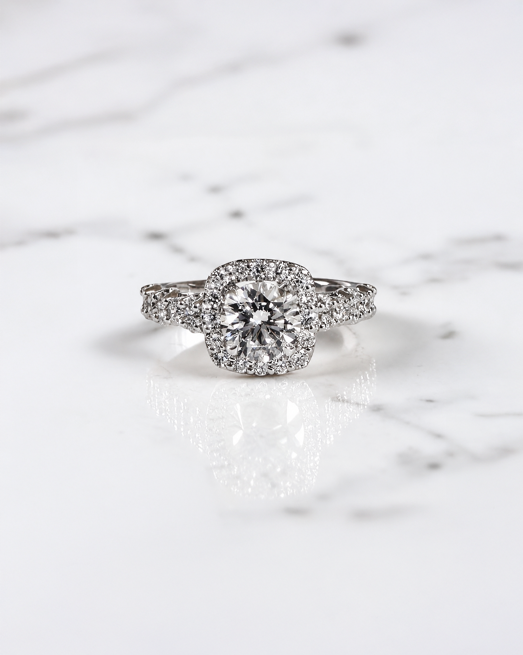 1ct round halo lab grown diamond engagement ring with fancy diamond set shoulders, 1.75ct total diamonds, handcrafted in 9ct white or yellow gold.