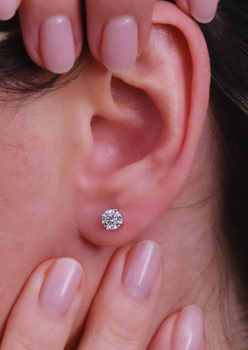 1ct Round Diamond Stud Earrings on ear