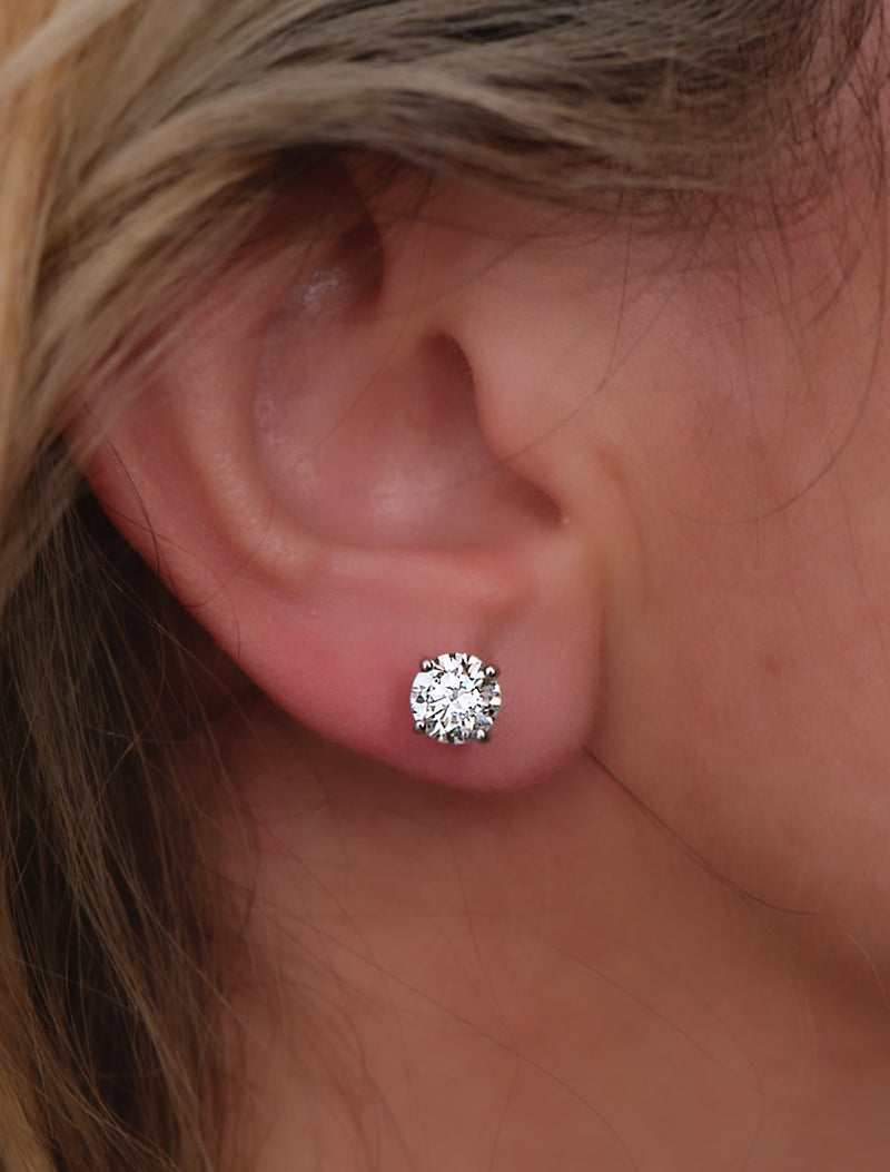 2ct Round Diamond Stud Earrings on ear