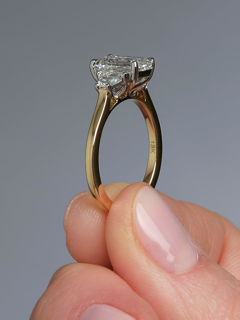 2ct Emerald Cut & Trapezoid Trilogy Ring diamond engagement rings.