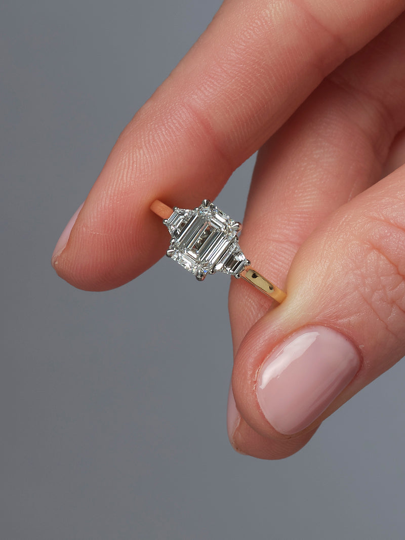 2ct Emerald Cut & Trapezoid Trilogy Ring diamond engagement rings.