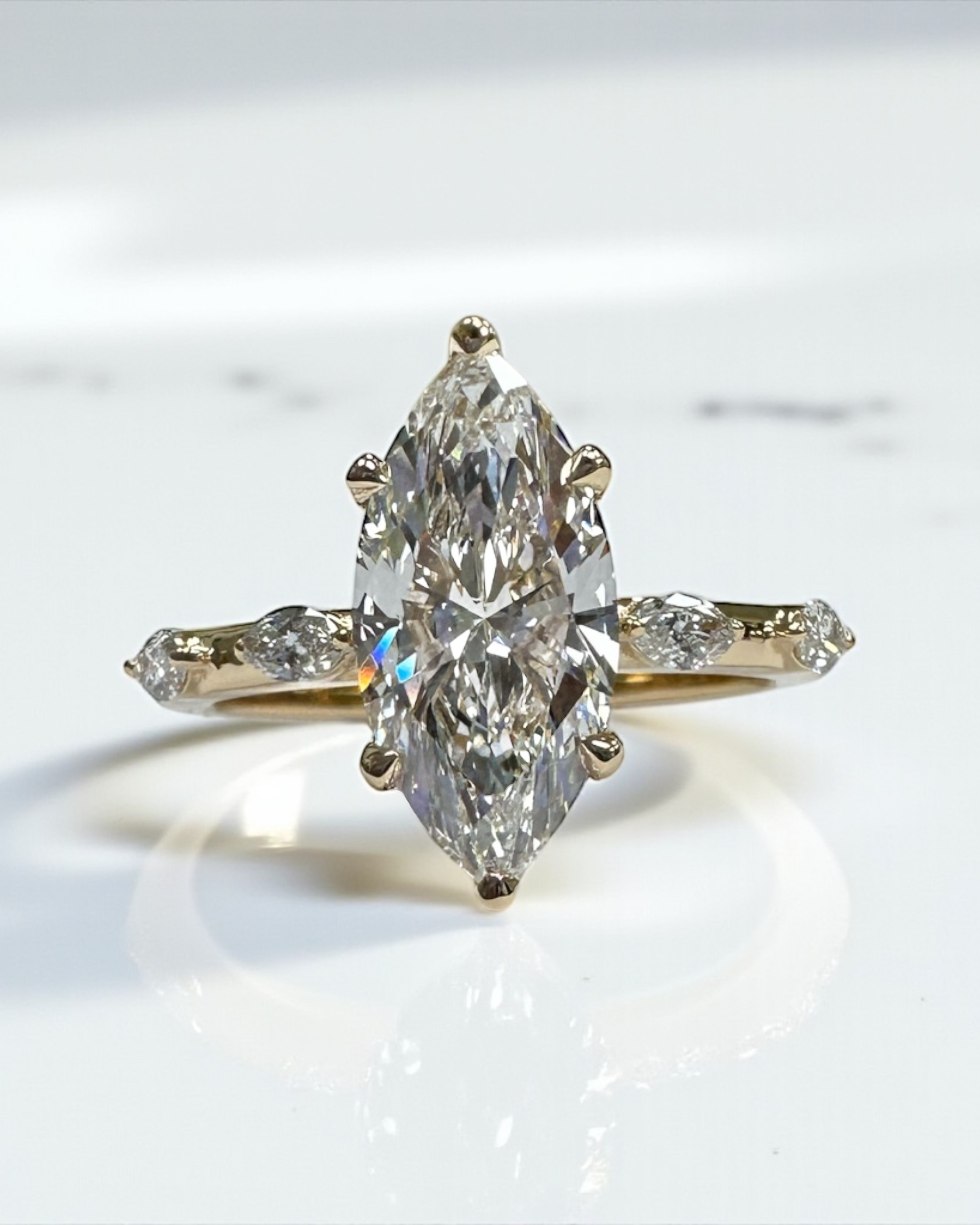 2ct marquise cut lab grown diamond marquise band spaced band hidden halo 18kt yellow gold engagement ring